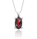 7mm x 12mm Garnet with 0.03ct Diamond pendant in 18K white gold