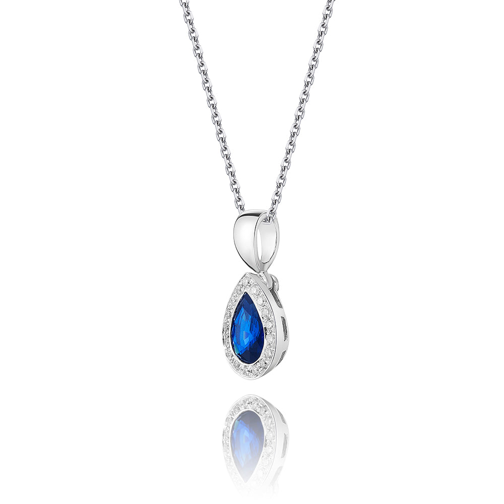 4mm x 6mm Blue Sapphire and 0.05ct Diamond pendant in 9K white gold