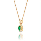 3mm x 5mm Emerald and 0.05ct Diamond pendant in 18K yellow gold