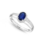 Sapphire Ring 5x7mm Oval Sapphire & 0.14ct Diamonds in 18K White Gold