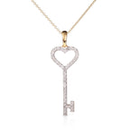 Gold key pendant necklace with diamonds