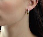 Gradualting 0.25ct diamond hoop earrings in 9K yellow gold