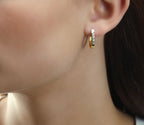 Wave 0.25ct diamond hoop earrings in 9K yellow gold