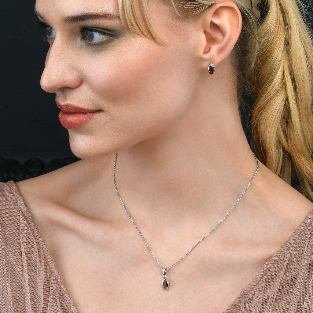 Marquise Shaped Garnet Stud Earrings in Sterling Silver