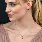 Marquise Shaped Garnet Stud Earrings in Sterling Silver