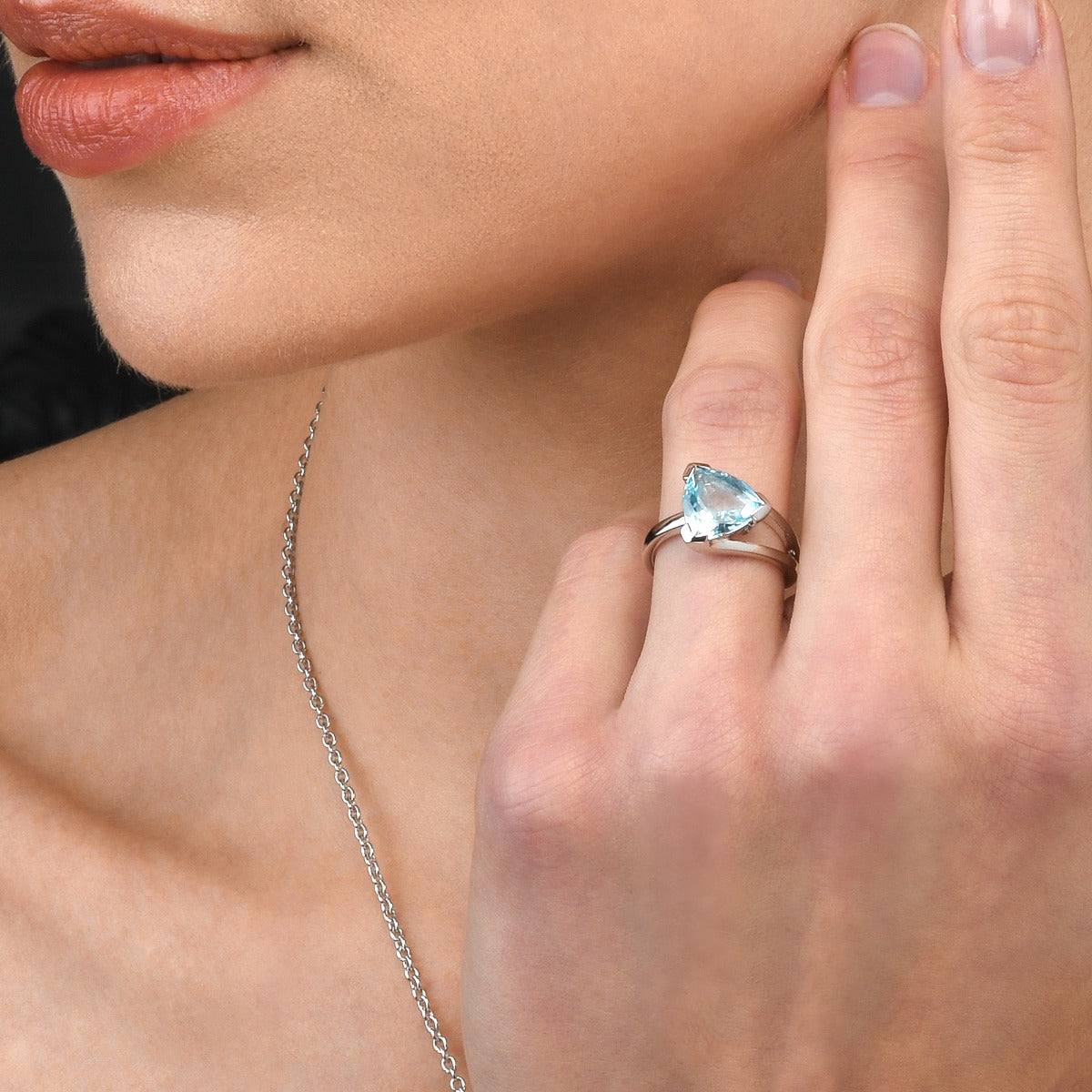 Sterling Silver Ring with a Trillion Cut Blue Topaz Gemstone 