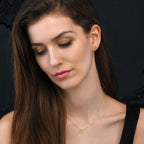 Gold plated om earrings for women