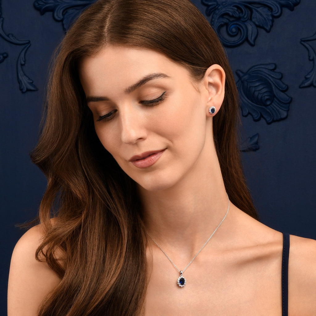 Sterling Silver Oval Shaped Blue Halo Stud Earrings