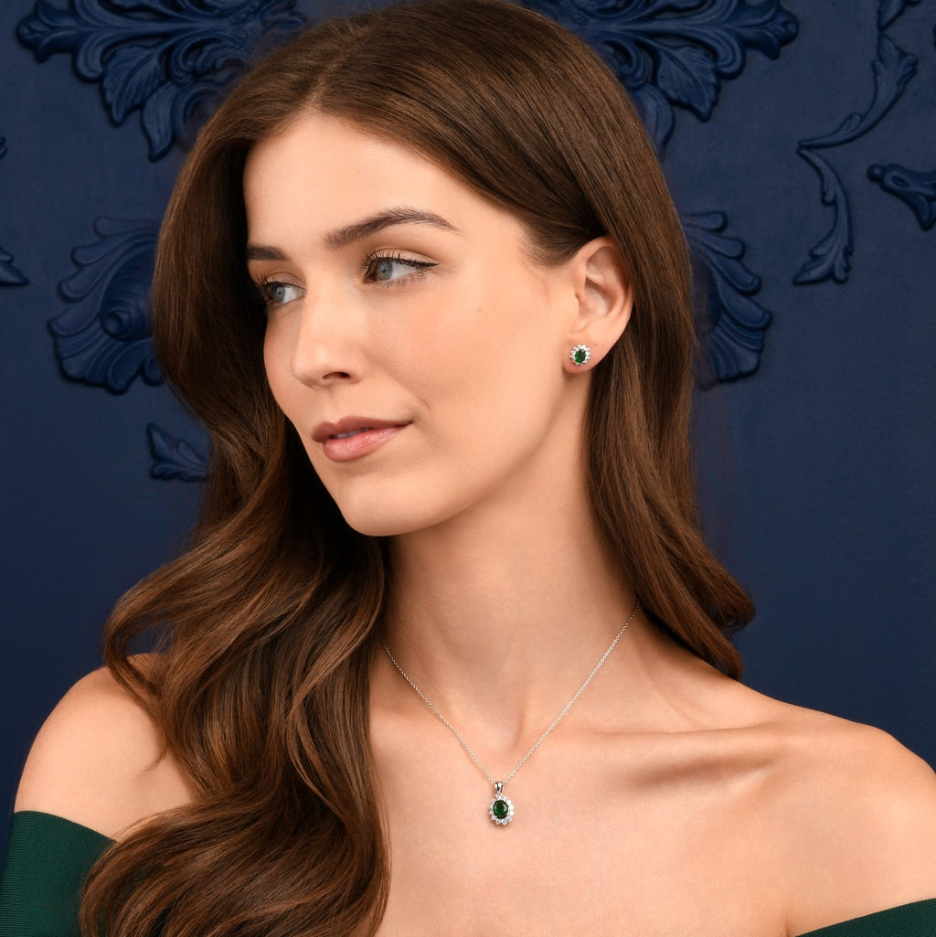 Sterling Silver Oval Shaped Green Halo Stud Earrings