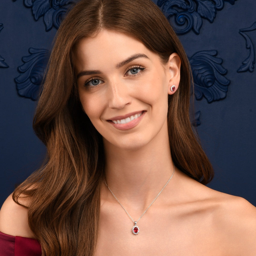 Sterling Silver Oval Shaped Red Halo Stud Earrings