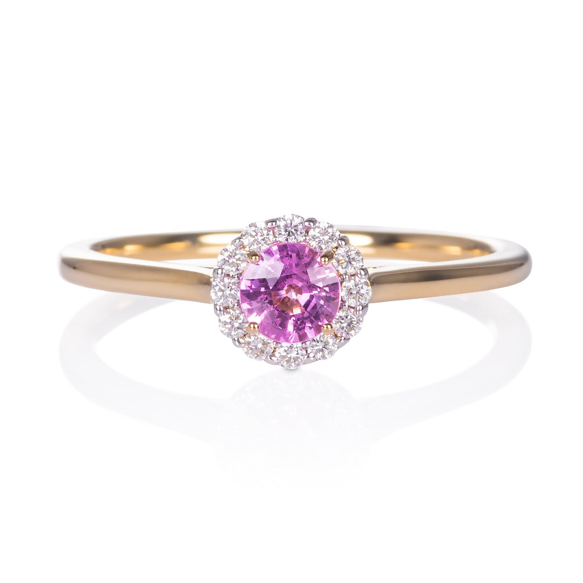Pink sapphire halo ring in yellow gold 9K