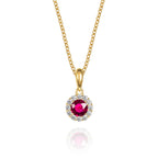 small ruby halo necklace in 9ct yellow gold
