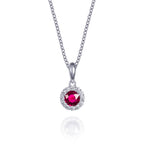 Ruby halo necklace in 9ct white gold
