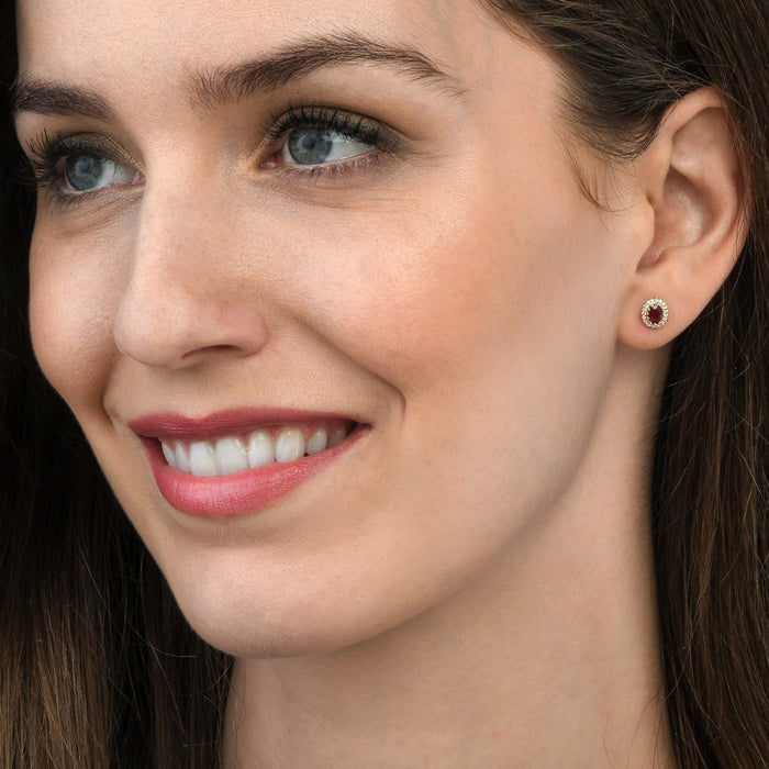 0.65ct Oval Ruby Earrings with Diamond Halo 9K Yellow Gold