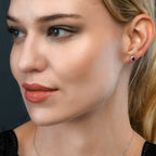 Oval Ruby Stud Earrings with 0.23ct Diamond Halo 18K White Gold