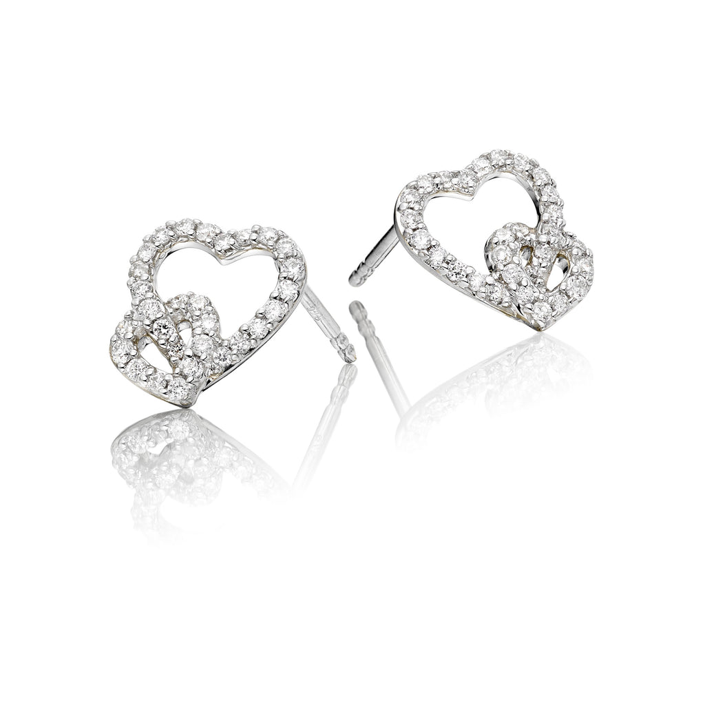 Interlocking heart shape 0.25ct diamond studs in 9K white gold