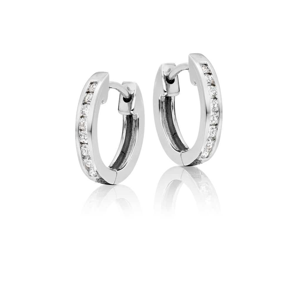 Channel set 0.25ct diamond hoop earrings in 9K white gold