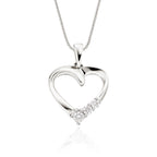 Heart trilogy 0.15ct diamond pendant in 9K white gold