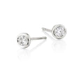 Solitaire 0.30ct bezel set round diamond studs in 18K white gold