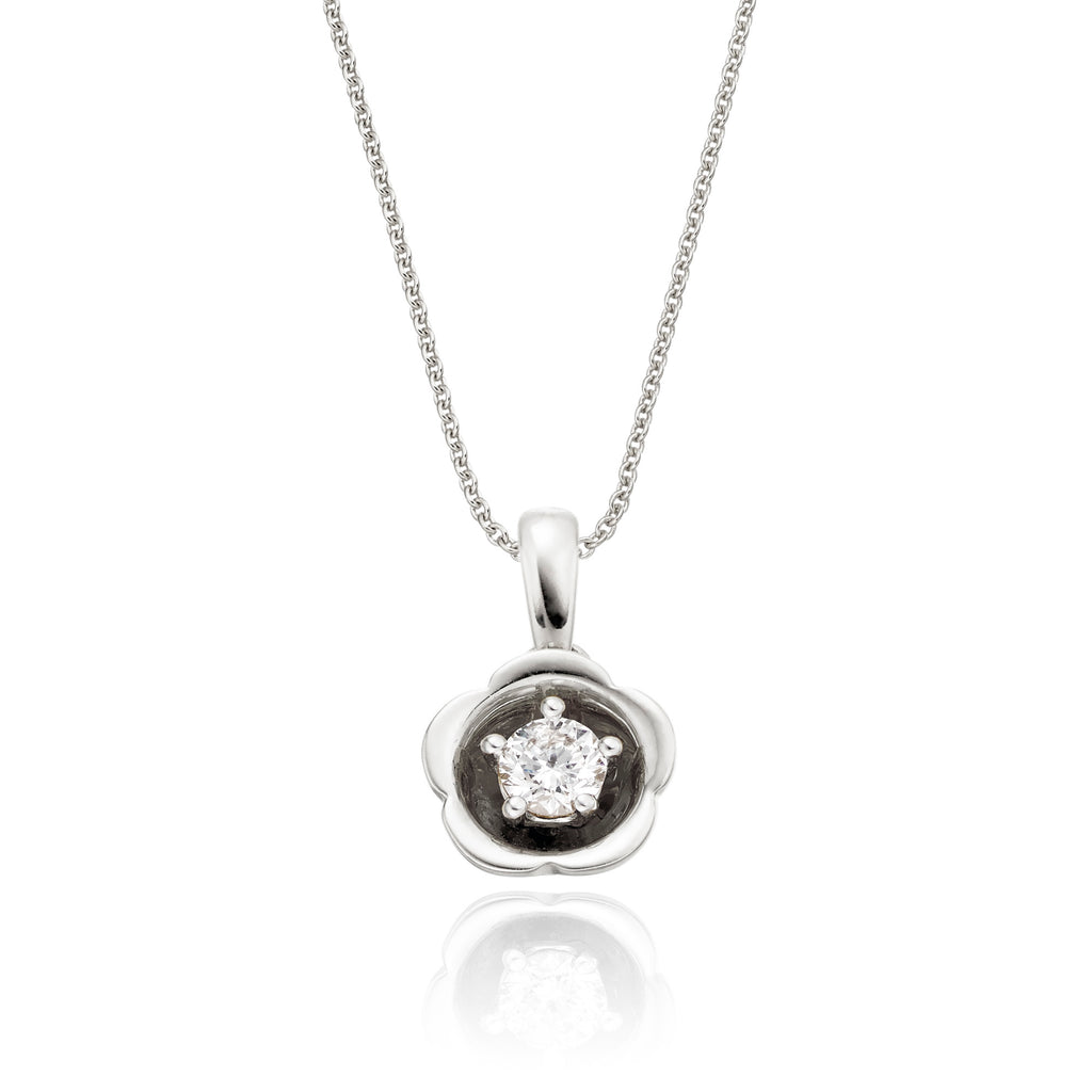 Flower solitaire 0.20ct round diamond pendant in 18K white gold