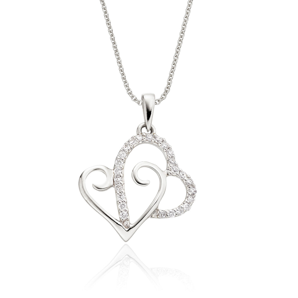 Heart shape 0.12ct diamond pendant in 18K white gold