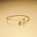 Yellow Gold Plated Sterling Silver Twin Heart Bangle with Cubic Zirconia