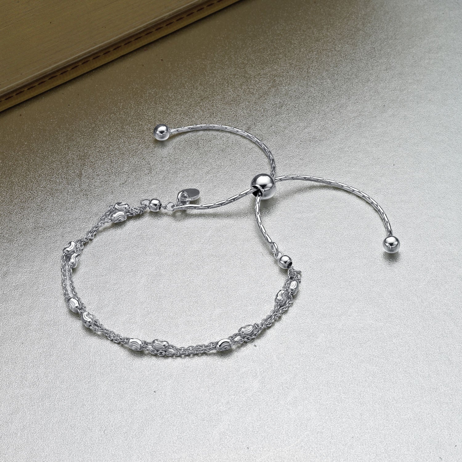 Sterling Silver Bracelet with Twin Line Diamond Cut Beads