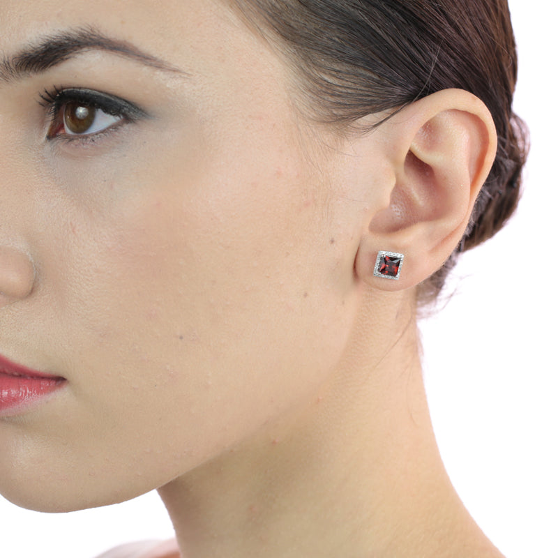 5mm x 5mm Garnet and 0.19ct diamond stud earrings in 18K white gold