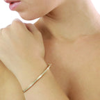 Channel Set 0.40ct diamond bangle in 18K yellow gold 