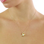 Freshwater pearl with 0.04ct diamond pendant in 18K yellow gold 