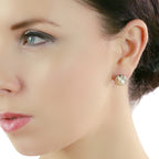 Oyster freshwater pearl & diamond studs in 18K white gold