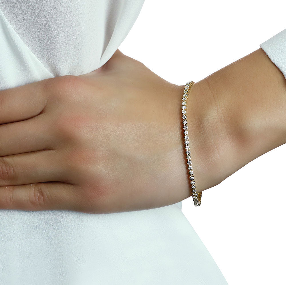 Basket Claw 1.00ct diamond tennis bracelet in 18K yellow gold
