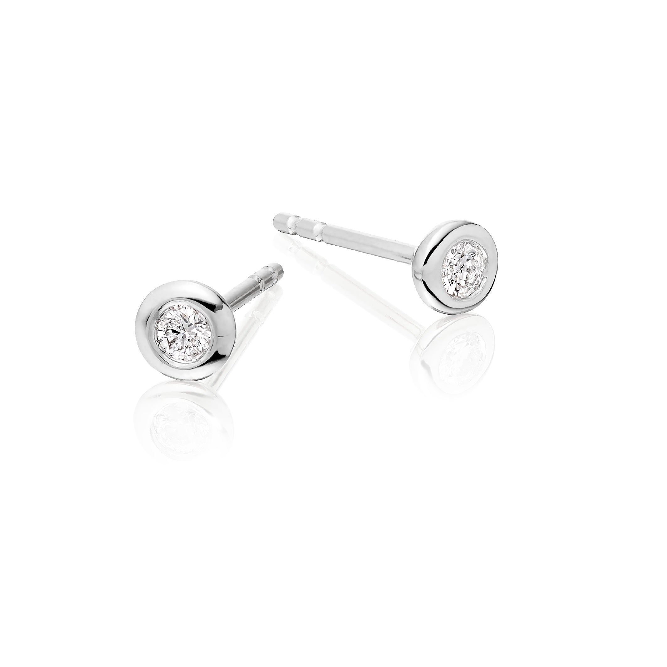 Solitaire 0.10ct Bezel set round diamond studs in 18K white gold