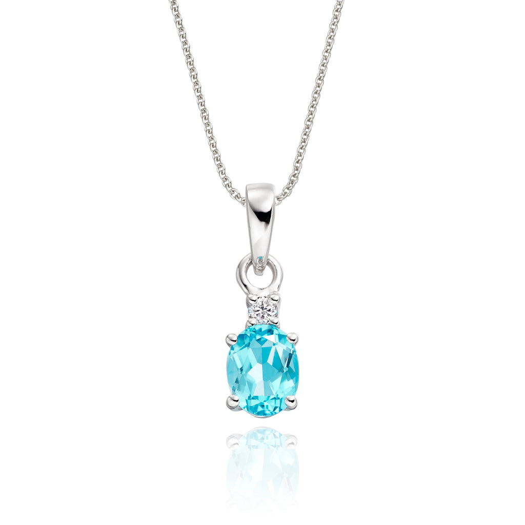 5mm x 7mm Blue Topaz with 0.04ct Diamond pendant in 9K white gold