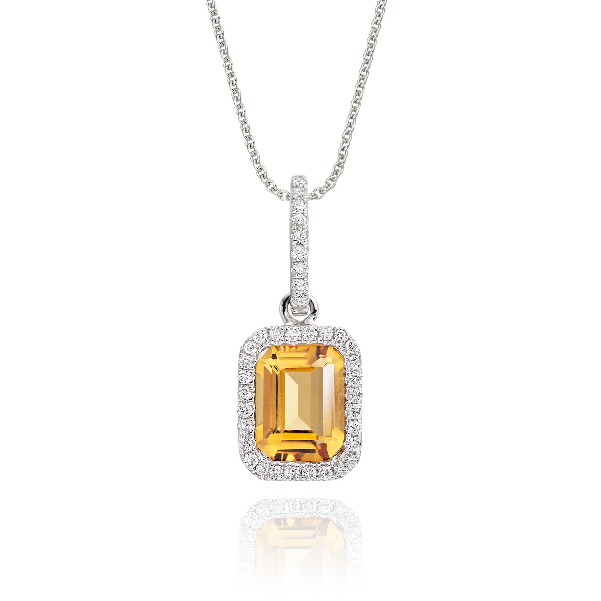 5mm x 8mm Citrine with 0.15ct Diamond pendant in 18K white gold