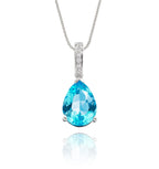 8mm x 12mm Blue Topaz with 0.05ct Diamond pendant in 18K white gold
