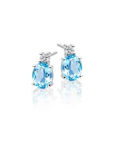 1.50ct Blue Topaz And 0.07ct Diamond Stud Earrings In 9K White Gold
