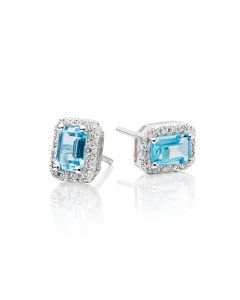 1.20ct Blue Topaz And 0.15ct Diamond Stud Earrings In 9K White Gold