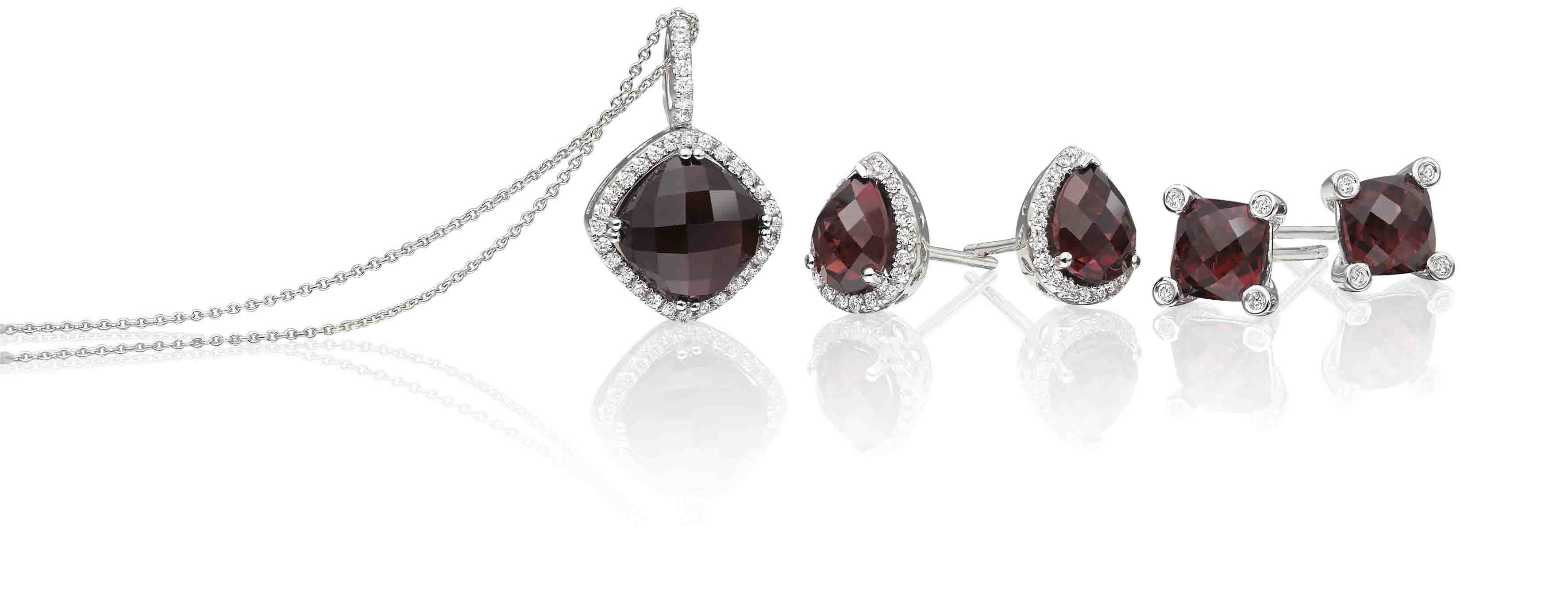 Garnet earrings made from white gold and garmet necklace made from white gold