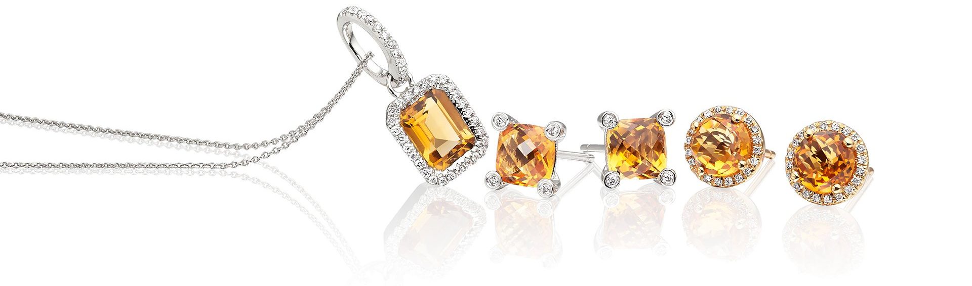 Citrine earrings made from white and yellow gold and citrine necklace made from white gold