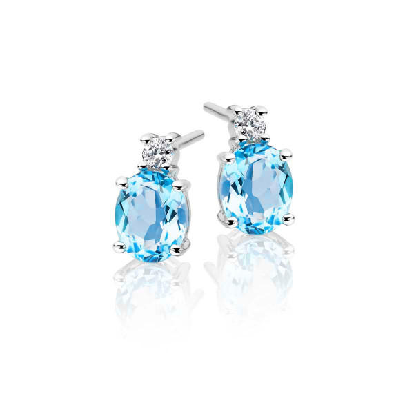 1.50ct Blue Topaz And 0.07ct Diamond Stud Earrings In 9K White Gold